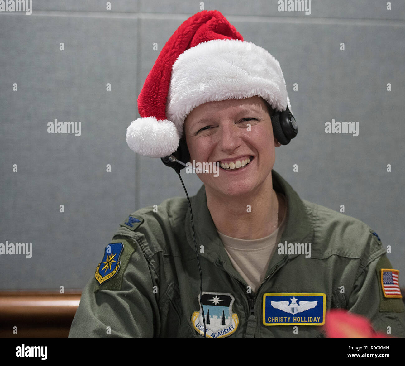 Colorado Springs, Colorado, USA. 24th Dec 2018. A volunteer answers phones and emails from children around the world during the annual NORAD Tracks Santa event at Peterson Air Force Base December 24, 2018 in Colorado Springs, Colorado. Last year NTS had more than 1,600 volunteers answering 125,000 phone calls, 2,000 emails and 7,450 on-star requests from children around the world asking where Santa is at and when will he arrive at their house. Credit: Planetpix/Alamy Live News Stock Photo