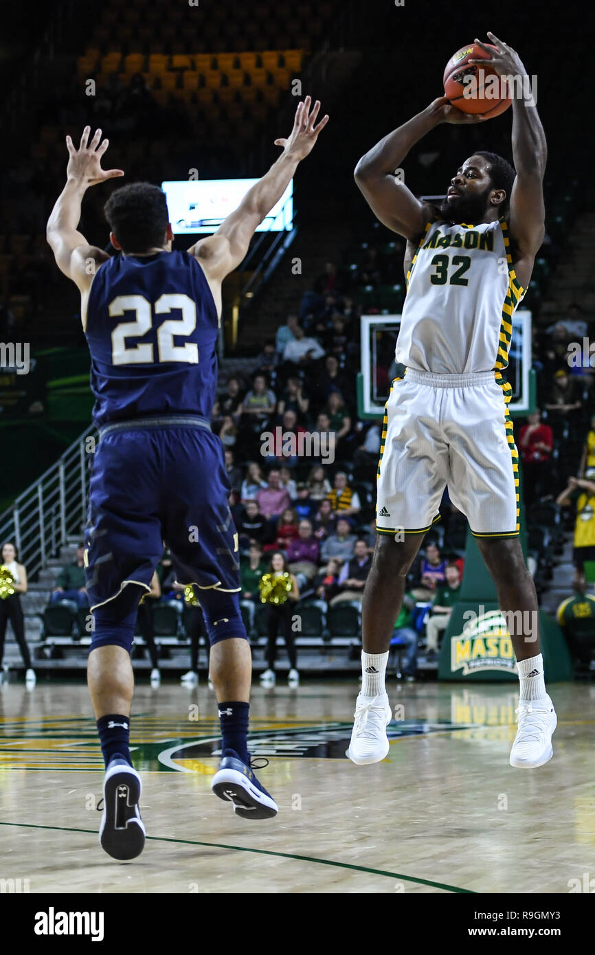 Fairfax, Virginia, USA. 21st Dec, 2018. George Mason Guard IAN BOYD (32) shoots a three pointer over the top of CAM DAVIS (22) during the game held at EagleBank Arena in Fairfax, Virginia. Credit: Amy Sanderson/ZUMA Wire/Alamy Live News Stock Photo