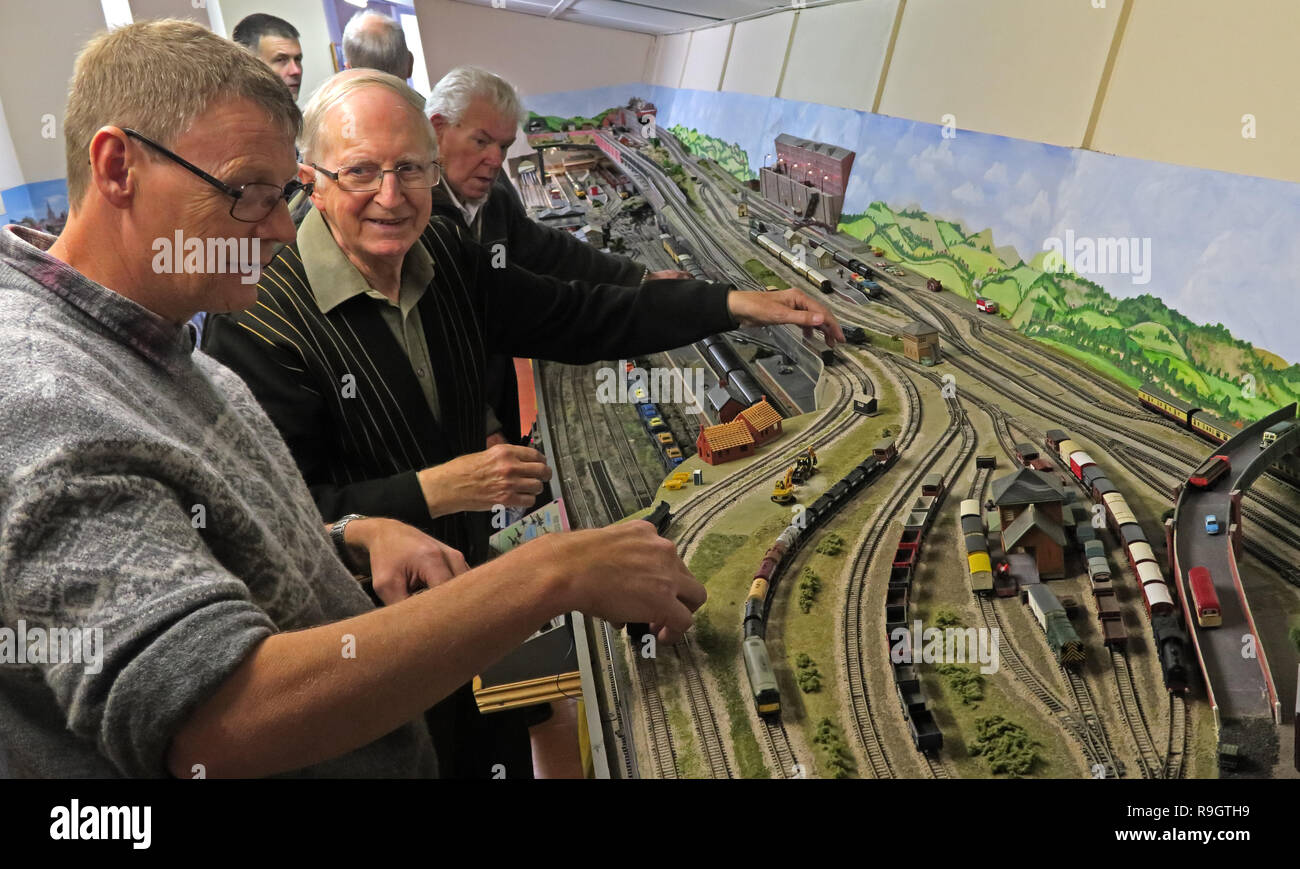 Railway model enthusiasts operate a large layout at a club, Grappenhall, South Warrington, Cheshire, North West England, UK, WA4 2SG Stock Photo