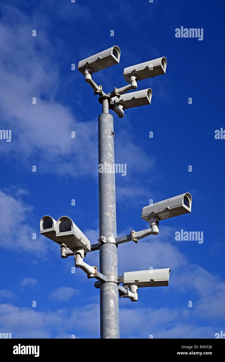 Seven Security Surveillance Closed Circuit AI Cameras, on a pole in a town centre, UK Stock Photo