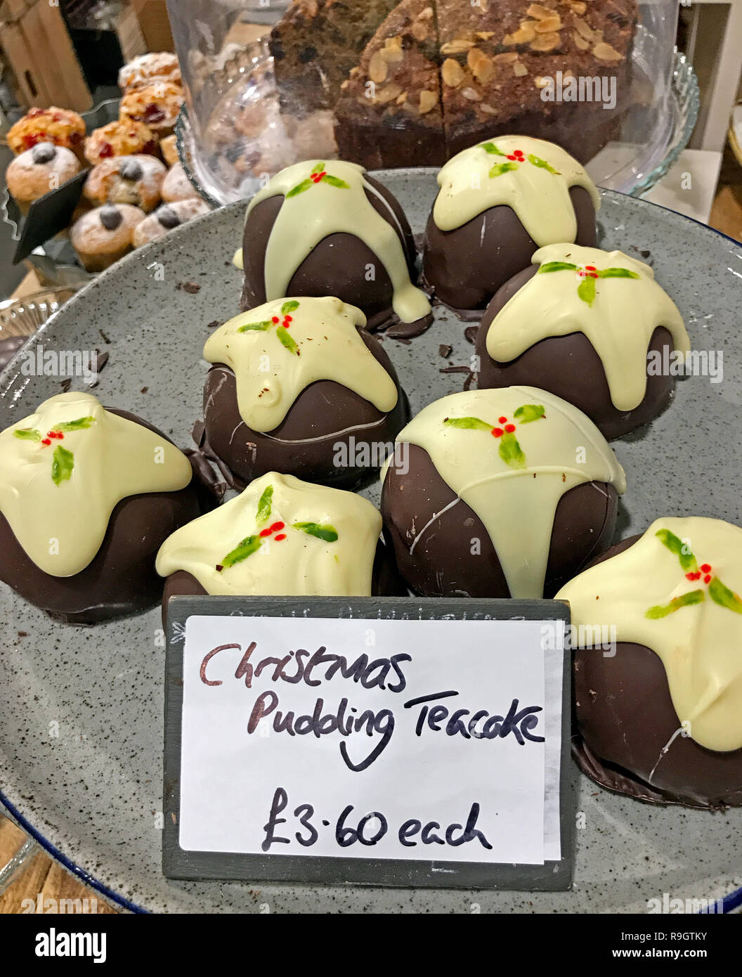 Christmas Pudding Giant Teacake Deserts, on a shop display ( Chocolate marshmallow teacakes  ) Stock Photo