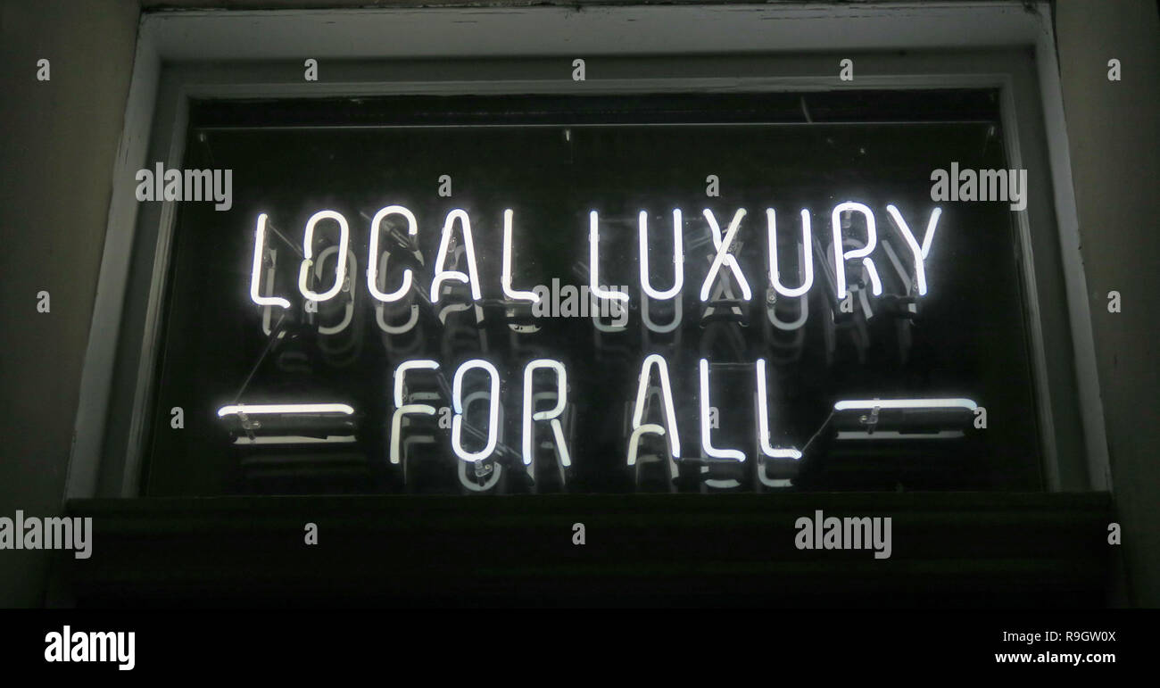 Black White Local Luxury For All sign, Edinburgh, Scotland, UK Stock Photo