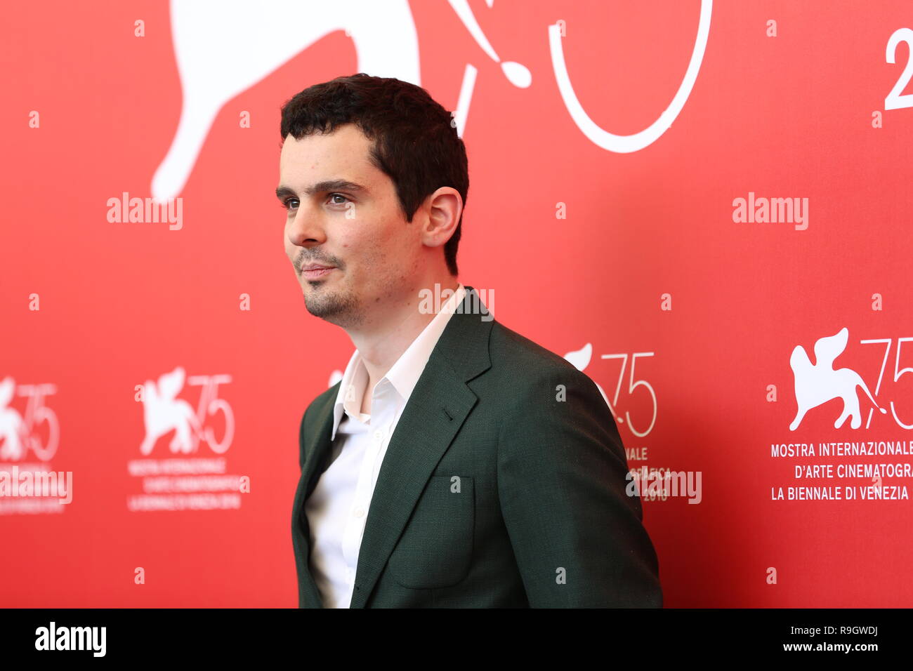VENICE, ITALY – AUG 29, 2018: Damien Chazelle attends the 'First Man' photocall at the 75th Venice International Film Festival (Ph: Mickael Chavet) Stock Photo