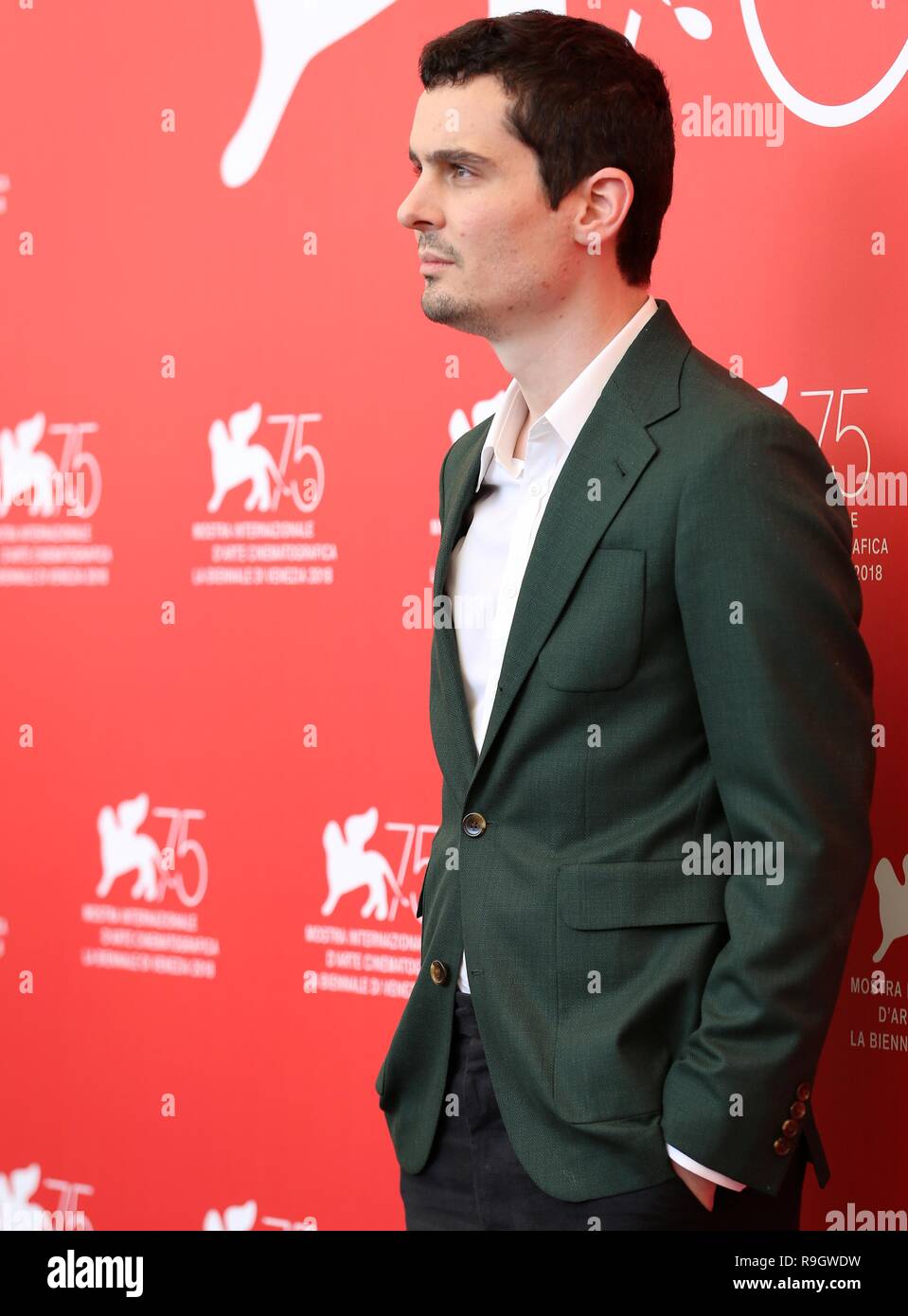 VENICE, ITALY – AUG 29, 2018: Damien Chazelle attends the 'First Man' photocall at the 75th Venice International Film Festival (Ph: Mickael Chavet) Stock Photo