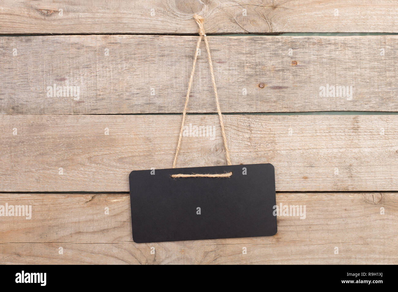 Black notice board with copy space on wooden background Stock Photo Alamy