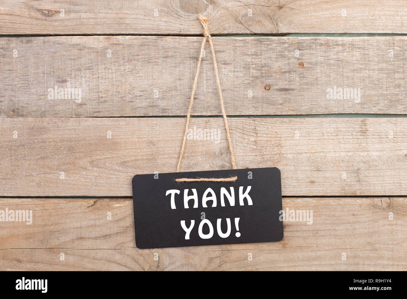 Blackboard with text "Thank you!" on wooden background Stock Photo Alamy