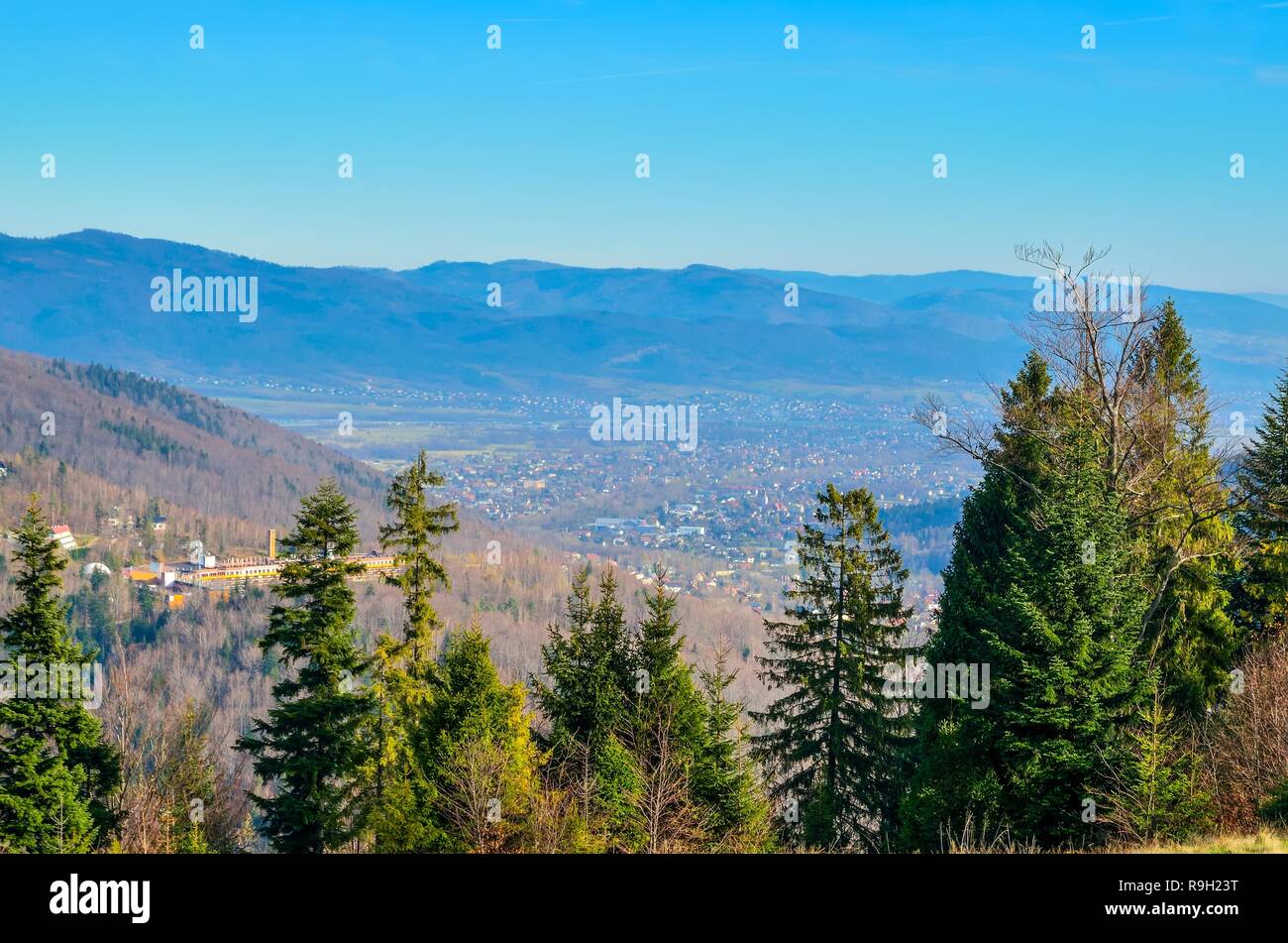 Autumnal mountain landscape. A beautiful mountain town in the valley in Szczyrk, Poland. Stock Photo