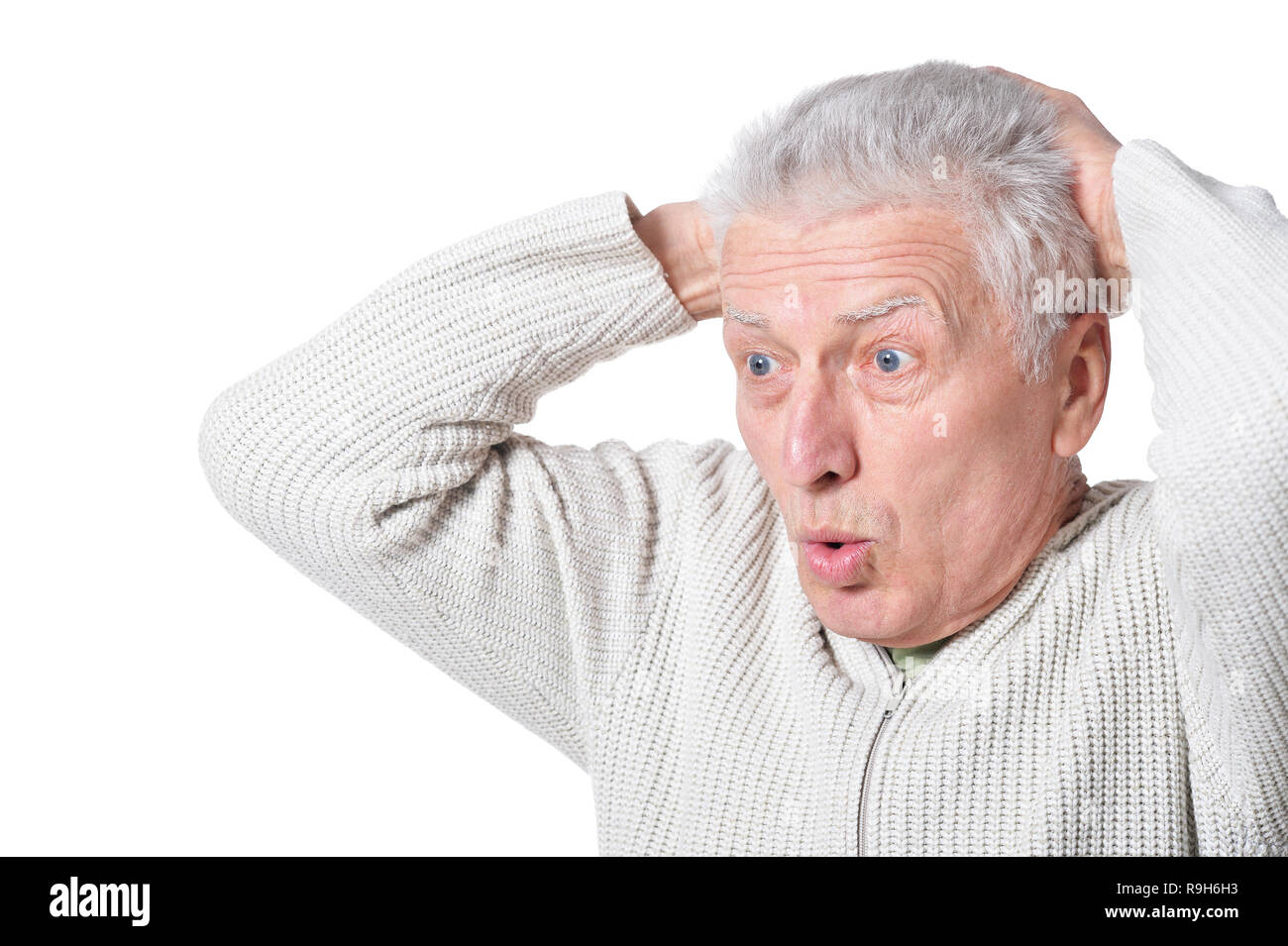 Portrait of senior man posing isolated on white background Stock Photo ...