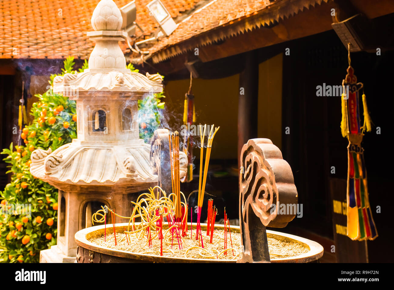 Incense sticks in the Buddhist Temple Tran Quoc Pagoda, Symbol of Hanoi