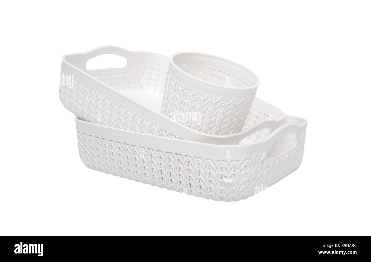 Set of plastic wicker baskets for domestic use. Isolated on white background Stock Photo Alamy