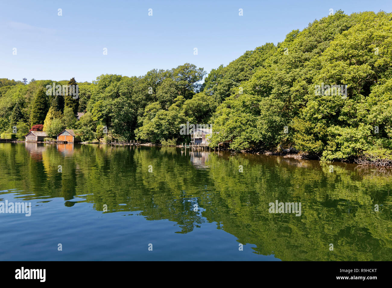 Boat houses on the banks of the Lake districts Lake Windermere in Cumbria in the National Park. Stock Photo