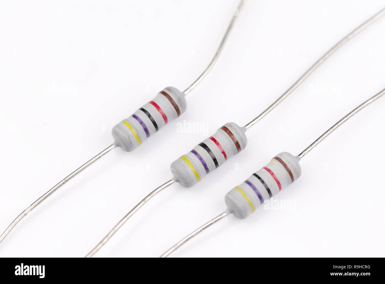 3 three electrical resistors isolated on a white background with