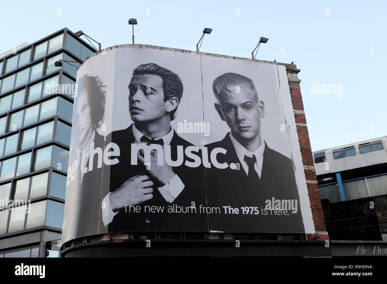 Advert poster billboard  in Shoreditch East London advertising the new album music of the Manchester band The 1975 in London England UK . KATHY DEWITT Stock Photo