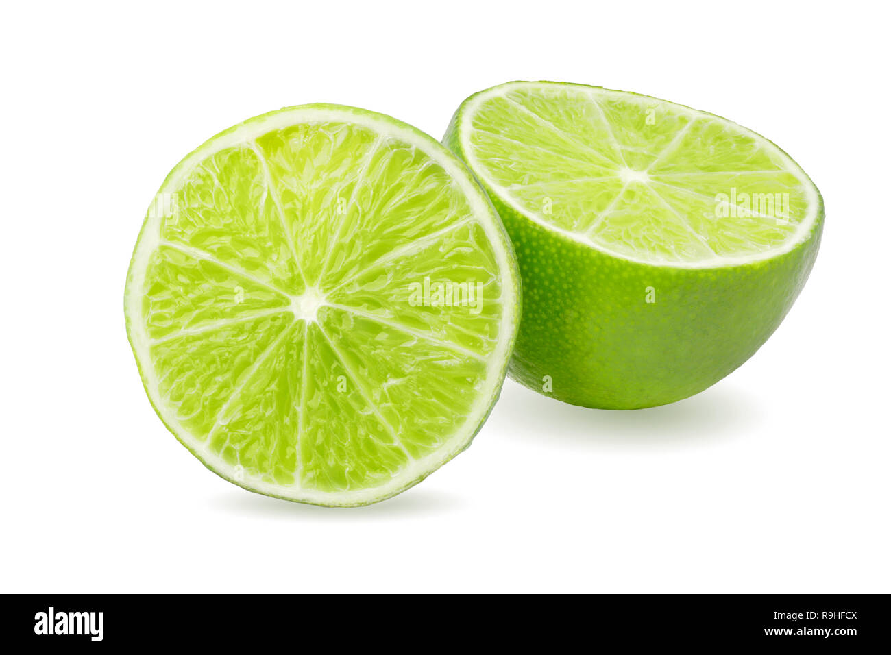 two green lime fruit haves isolated on white background Stock Photo