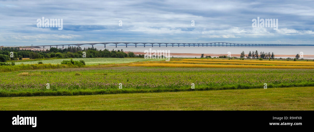 P.E.I. and New Brunswick Confederation Bridge.  Wide and long angle view of the inter provincial bridge on an muggy, overcast summer day in August. Stock Photo