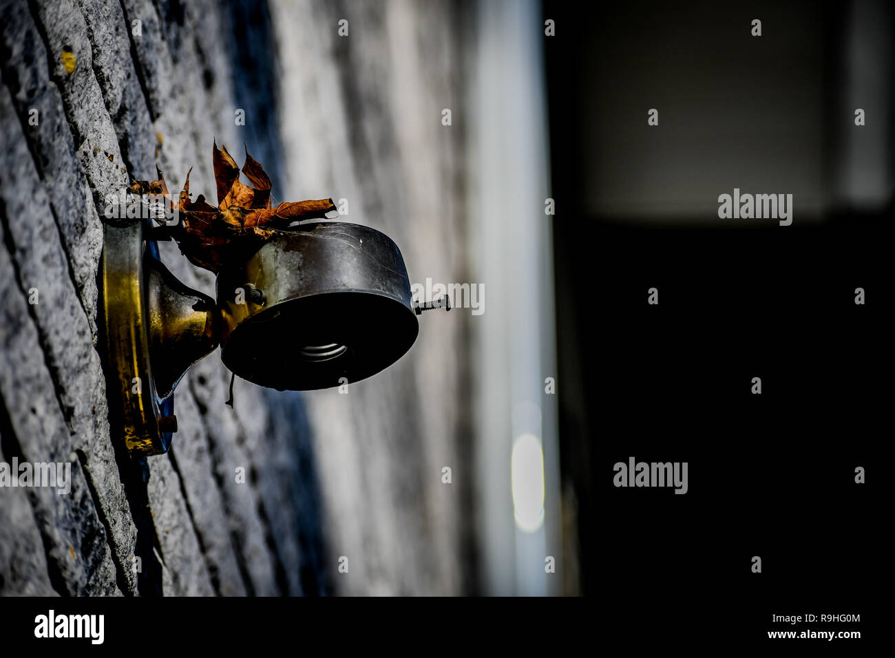 Creative light fixture above garage door hires stock photography and
