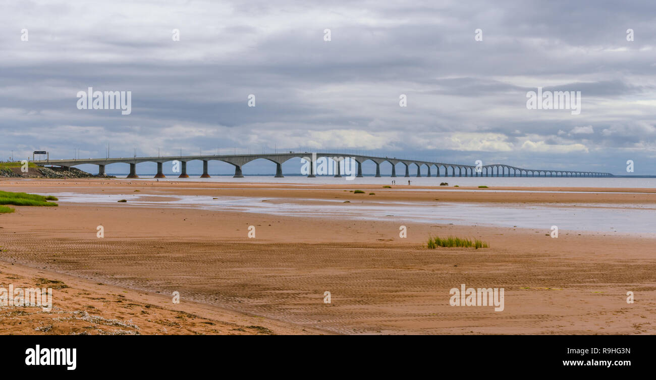 P.E.I. and New Brunswick Confederation Bridge.  Wide and long angle view of the inter provincial bridge on an muggy, overcast summer day in August. Stock Photo