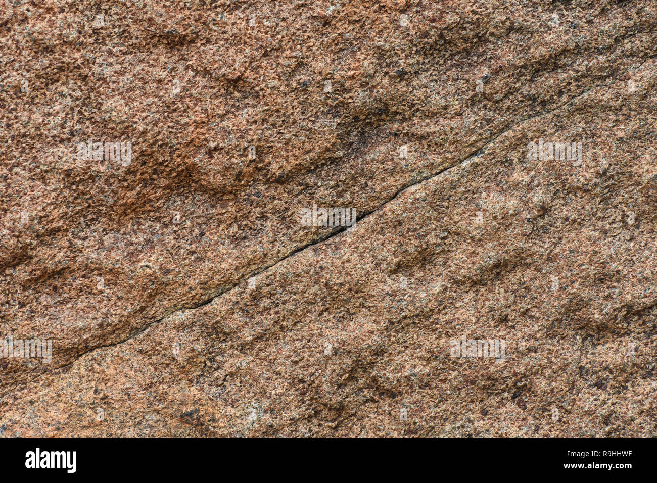 Natural Granite Rock Face Surface With Fissure Stock Photo
