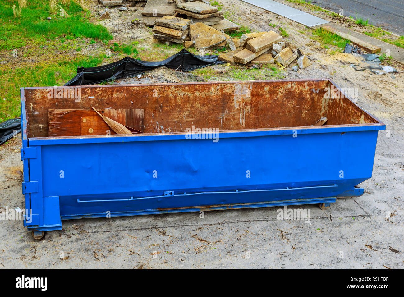 Construction wasted disposal bin used at the construction Stock Photo