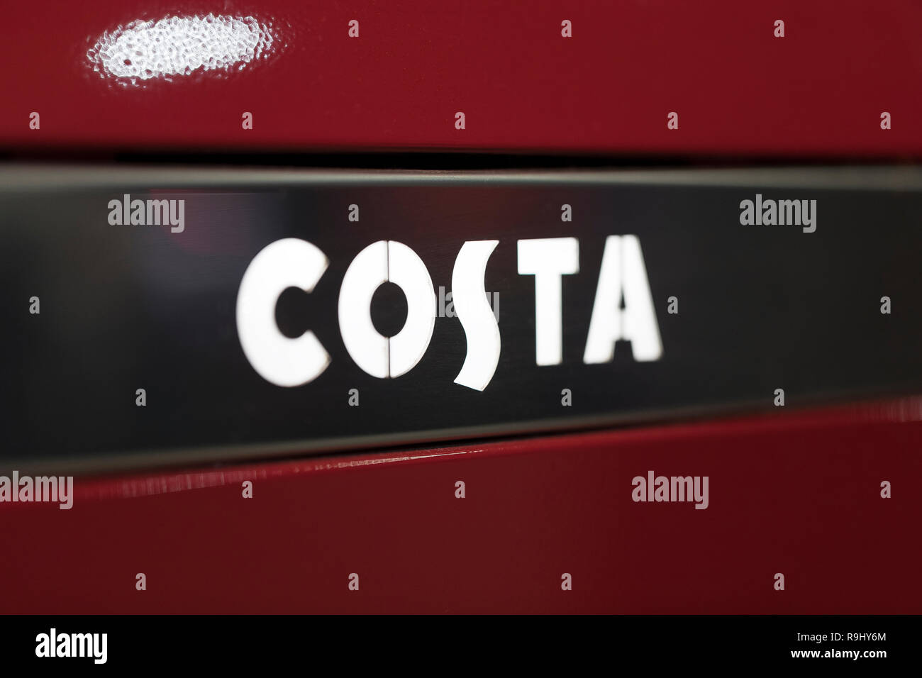 LONDON, UNITED KINGDOM - NOVEMBER 15th 2018: Close up photo of Costa logo on the coffee machine Stock Photo