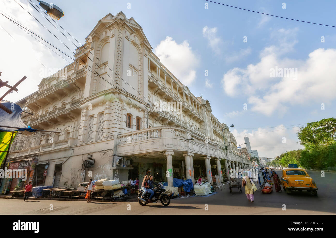 Colonial city heritage building the Grand hotel with view of early morning city road at Esplanade area of Kolkata, India. Stock Photo