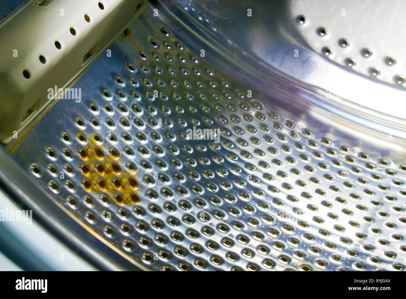 Rust on the drum of the new washing machine Stock Photo Alamy