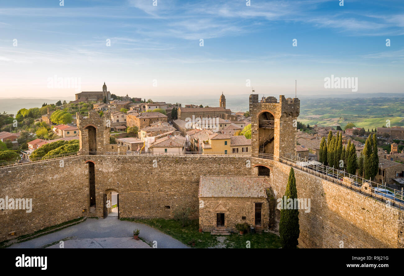 Aerial panoramic view of Montalcino fortress and old town at sunset. Toscana, Italy. Stock Photo