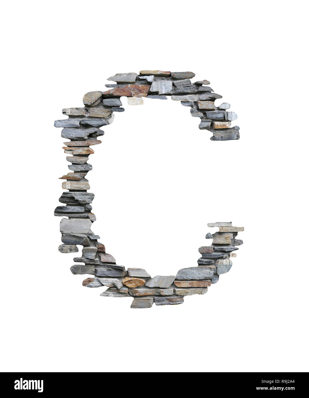 Font of C to create from stone wall isolated on white background with clipping paths. Stock Photo