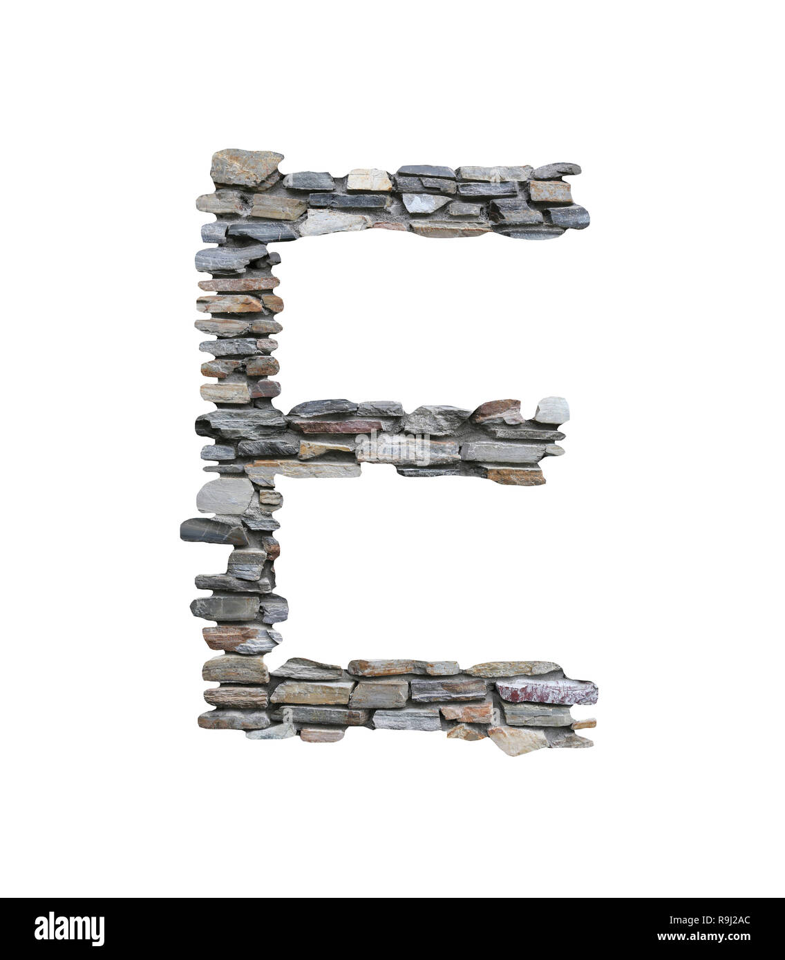 Font of E to create from stone wall isolated on white background with clipping paths. Stock Photo