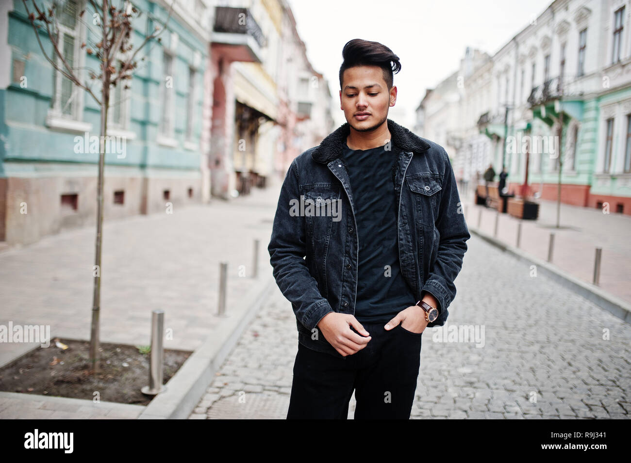 Handsome and fashionable indian man in black jeans jacket posed outdoor  Stock Photo - Alamy