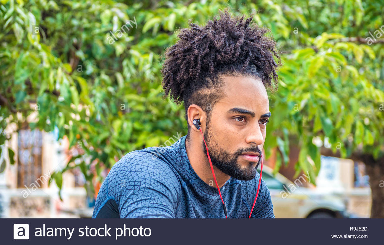 Attractive Young African American Man With Beard Curly Hair And