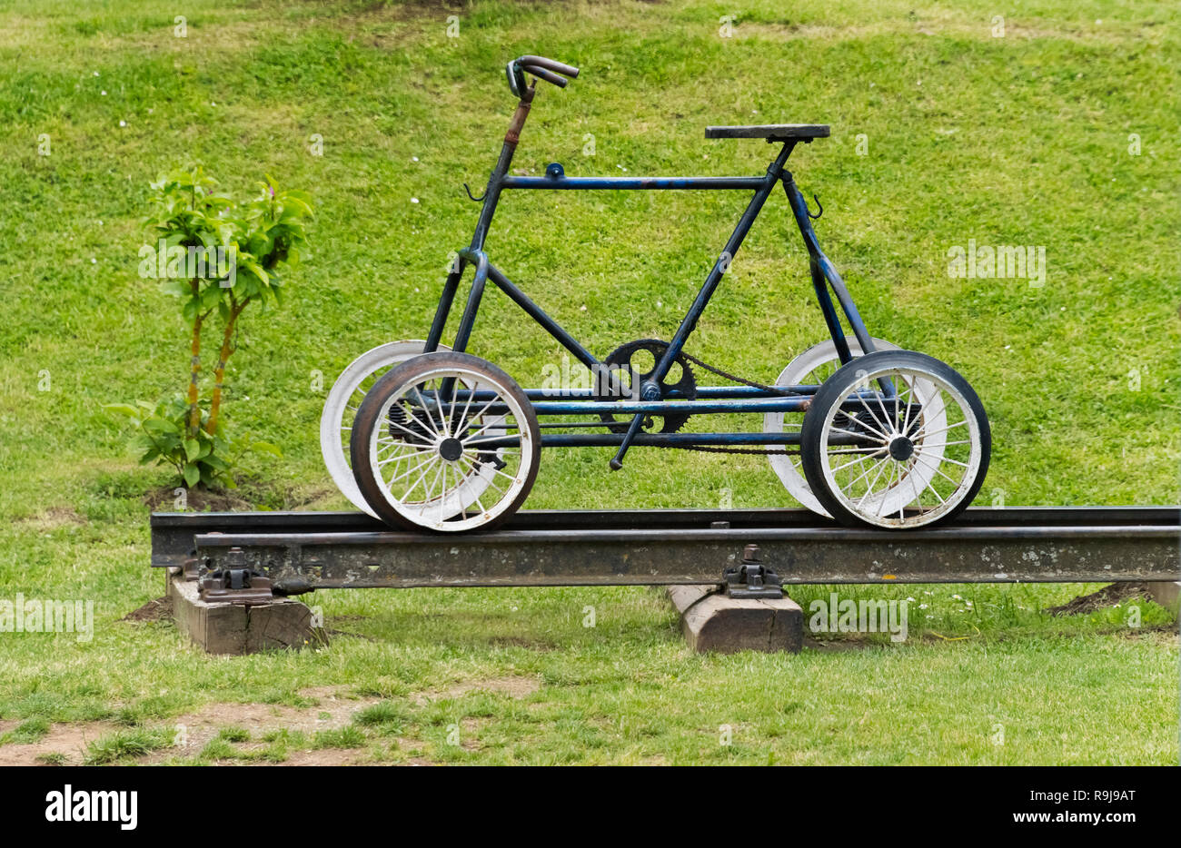 Four-wheel bike on railway track of Sargan Eight train in the station, a narrow-gauge heritage railway, Mokra Gora, Serbia Stock Photo