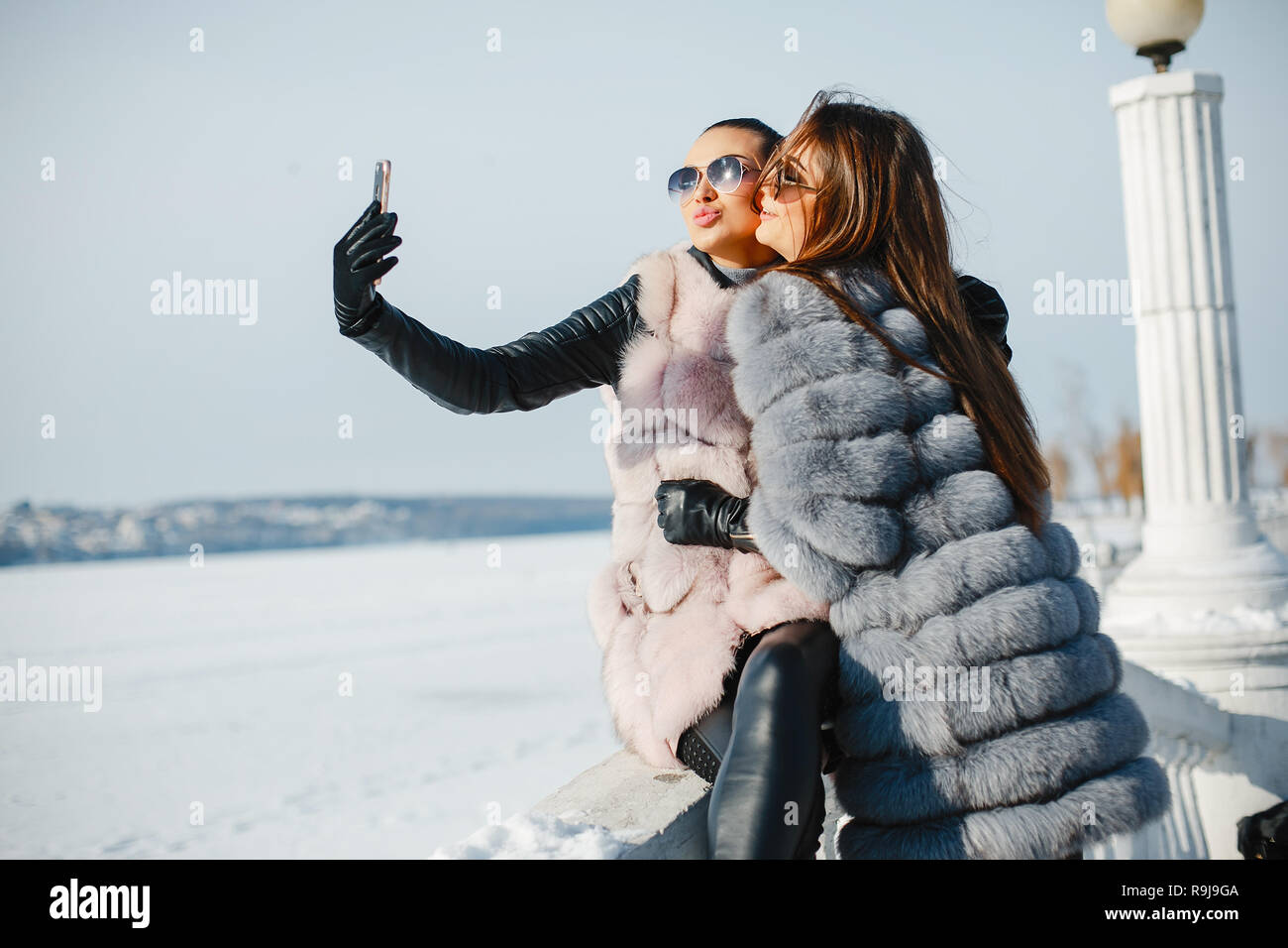 Two women in fur coats hi-res stock photography and images - Alamy