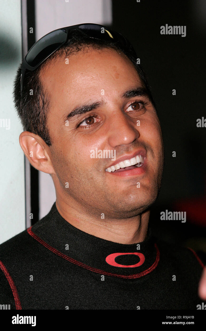 Juan Pablo Montoya waits for his turn to test a NASCAR Nextel Cup car after recently signing to drive for Chip Ganassi racing at Homestead Miami Speedway in Homestead, Florida on October 17, 2006. Stock Photo