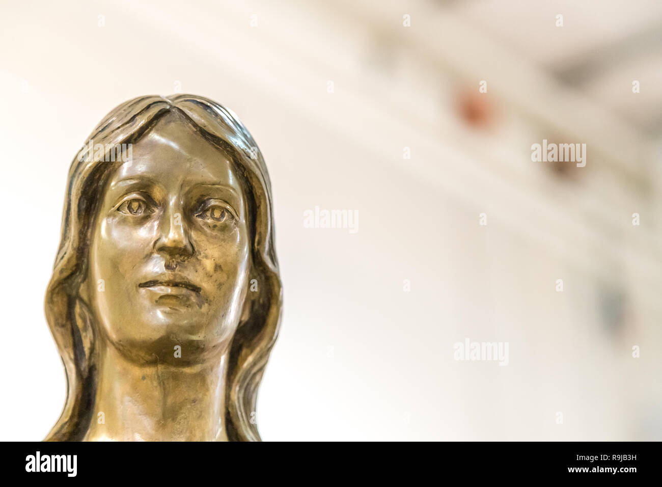 bronze statue of young woman Stock Photo Alamy