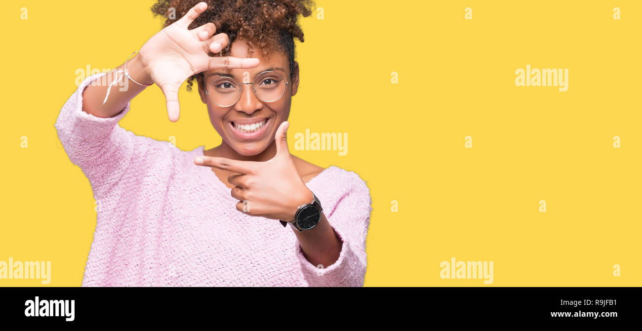 Beautiful young african american woman wearing glasses over isolated ...