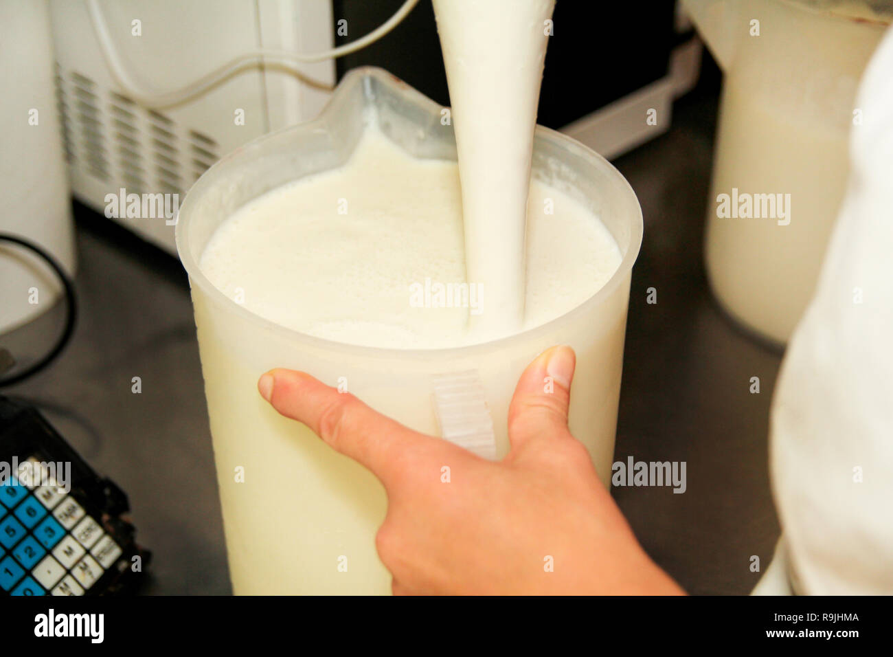 Ice Cream Ingredients Mix Together With Blender Female Chef Is Mixing Milk And Preparing Basics For Ice Cream Production Woman Making Ice Cream Stock Photo Alamy