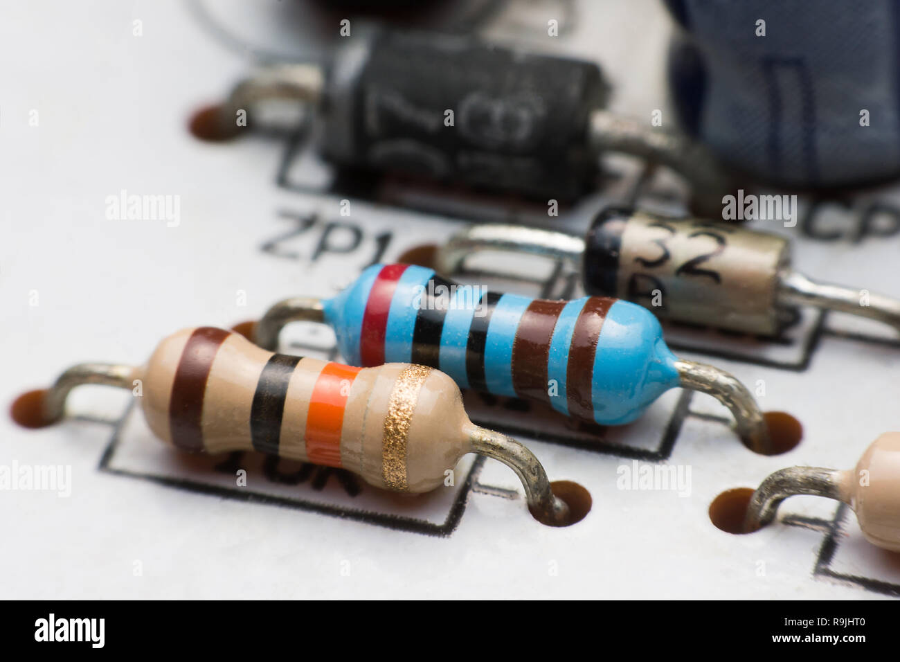 Resistor, Capacitor and Diode on Circuit Board close up. electronic