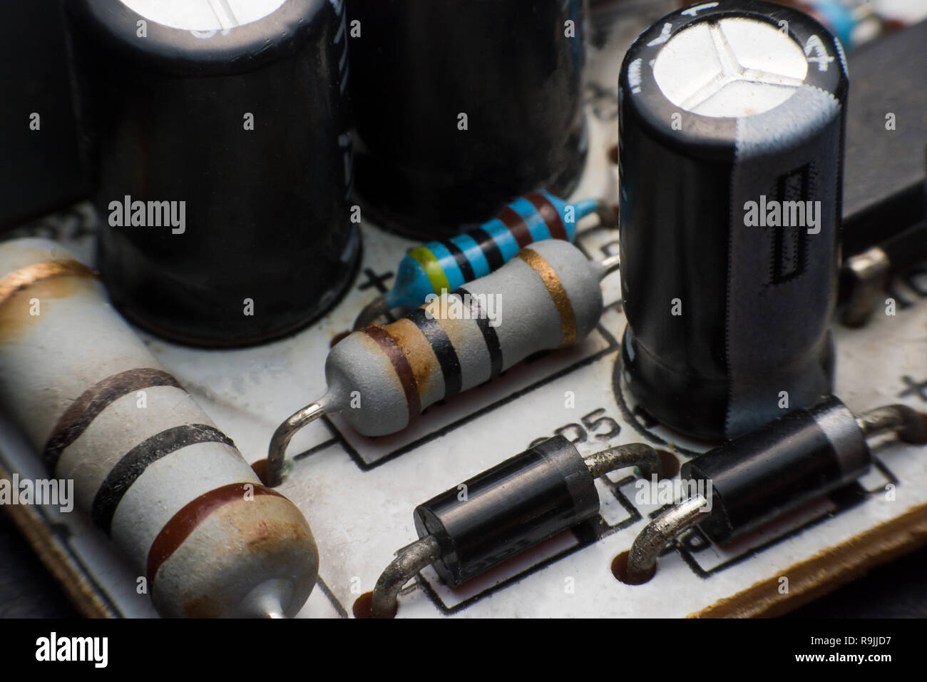 Resistor, Capacitor and Diode on Circuit Board close up. electronic
