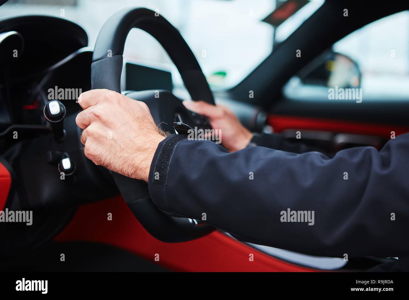 Hold the steering wheel hi-res stock photography and images - Alamy