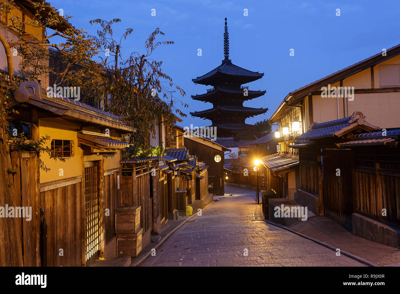 Japanese pagoda and old houses in Kyoto at twilight Stock Photo