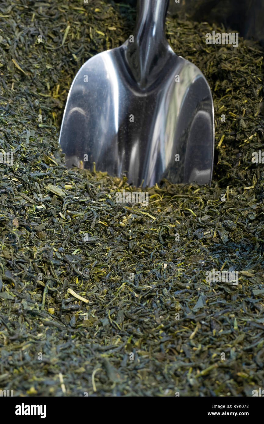 Metal tea scoop in a box with Japanese green tea Stock Photo Alamy