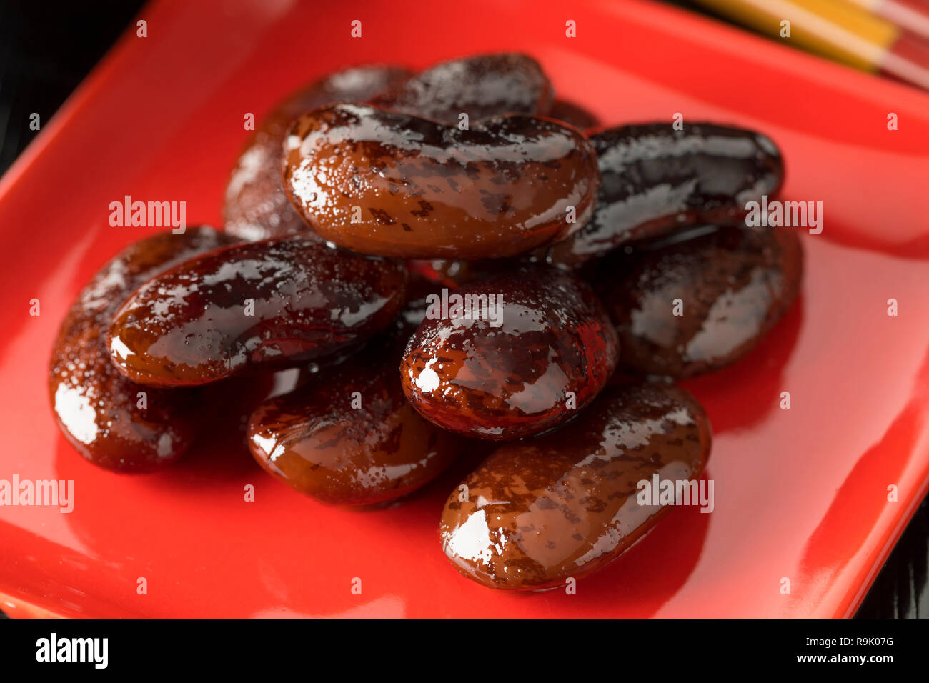 Large scarlet runner beans in syrop, called Hanamame in Japan, close up Stock Photo