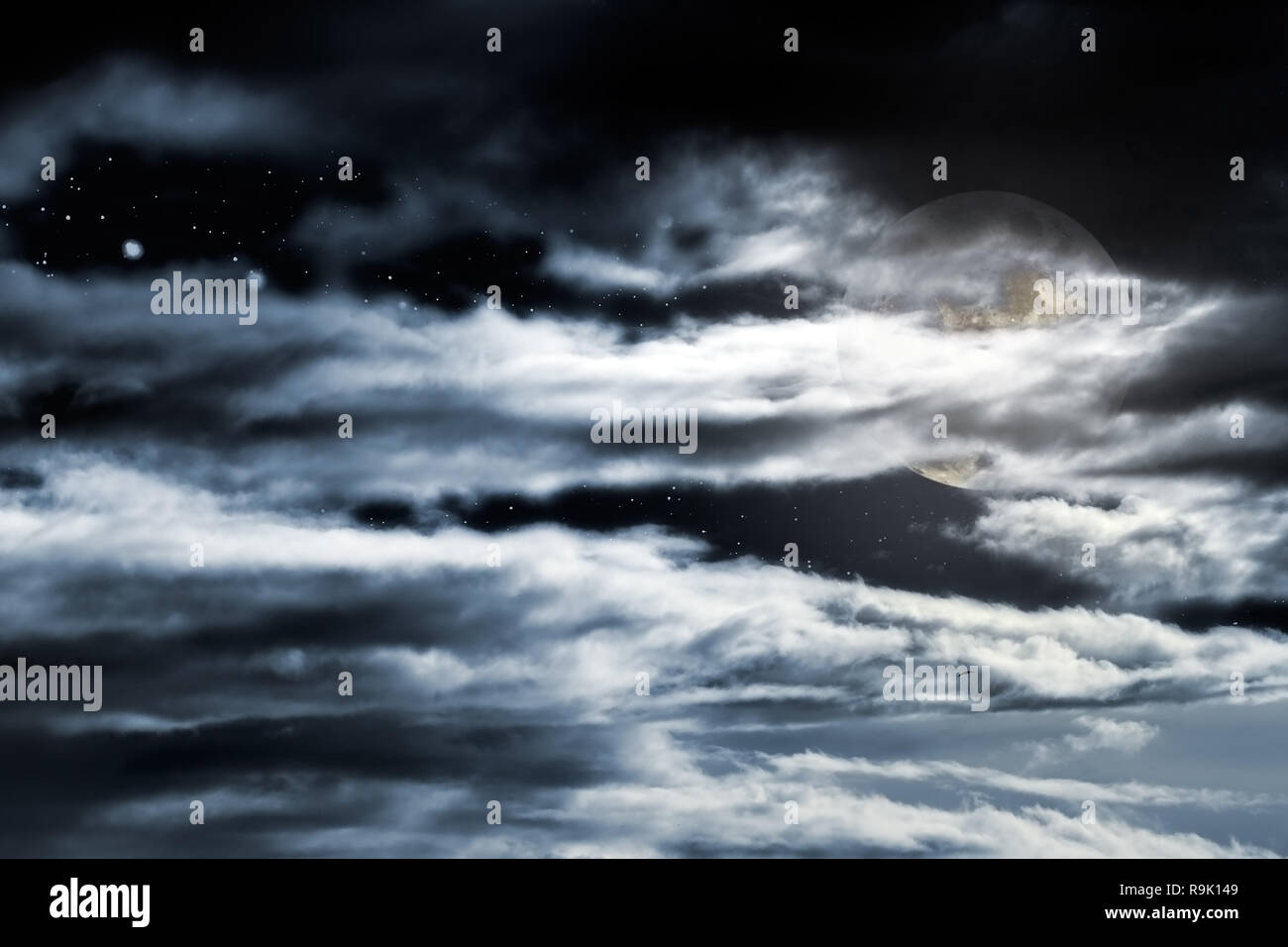 Cloudy full moon sky with stars Stock Photo - Alamy