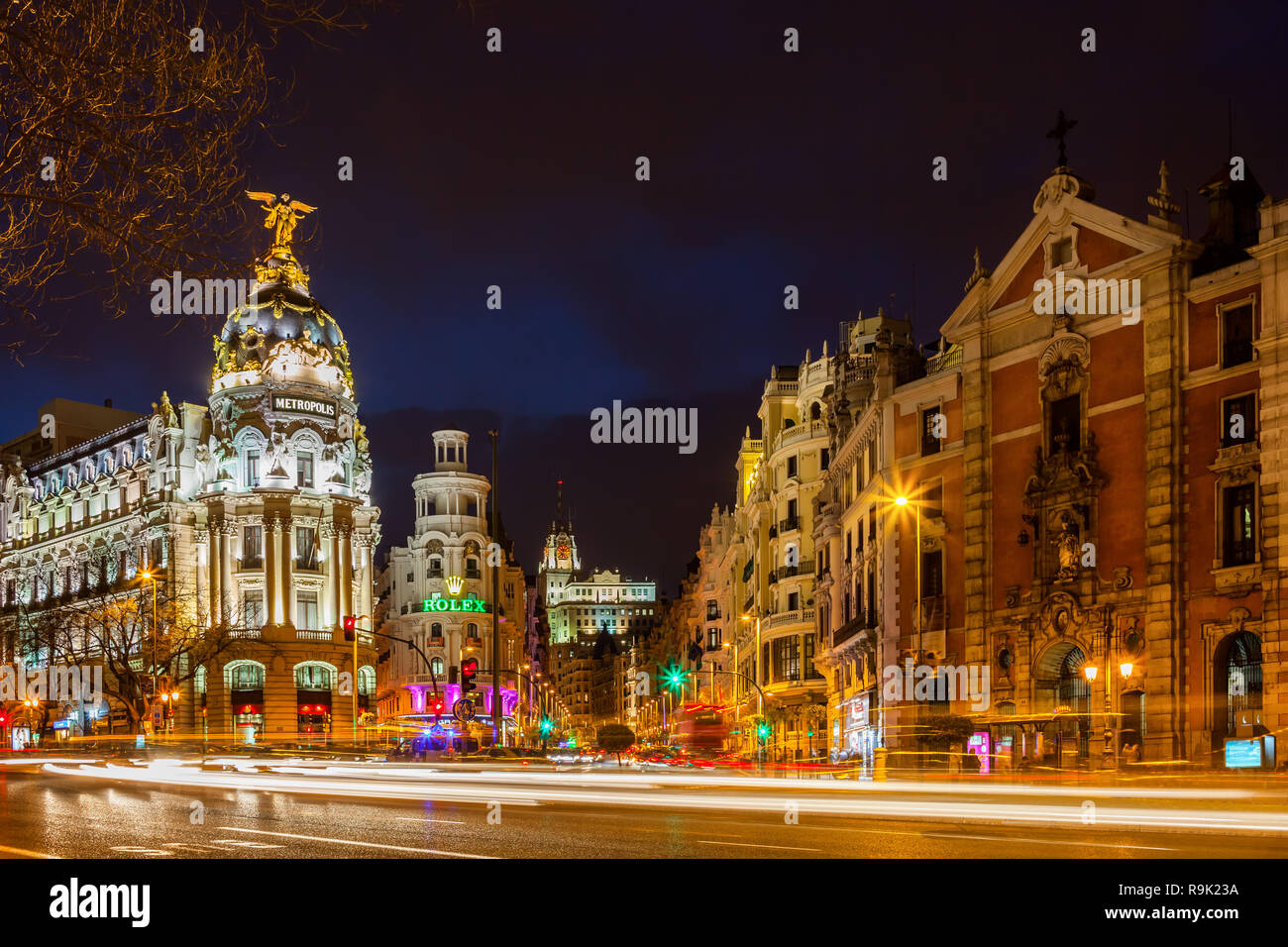Madrid by night, capital city of Spain, view from Calle de Alcala street to Metropolis Building, Gran Via street and San Jose church Stock Photo