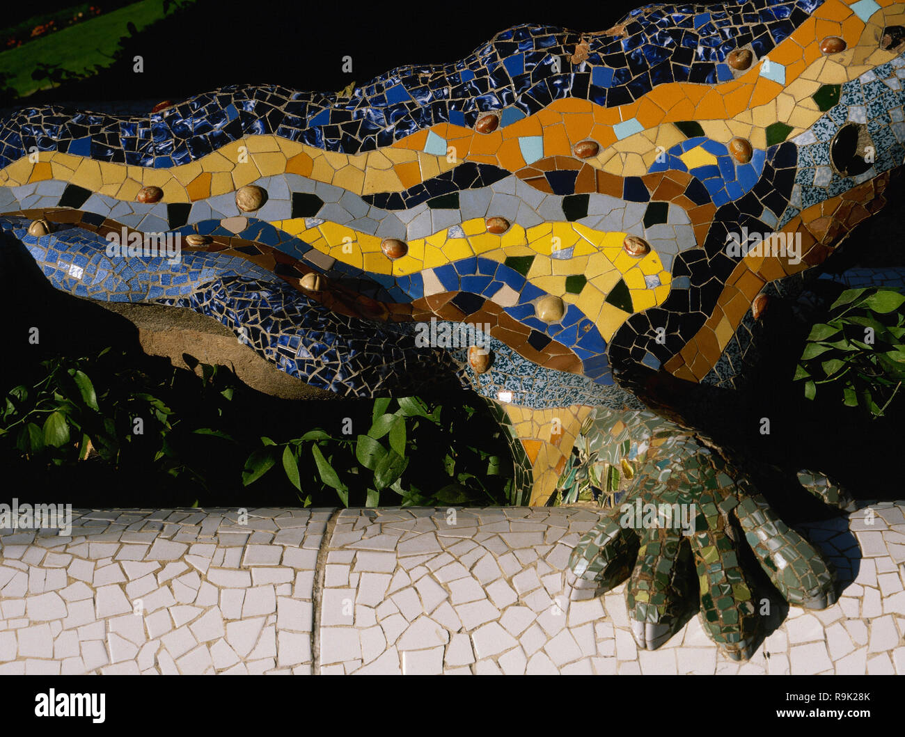 Barcelona, Catalonia, Spain. Park Guell, designed by Modernist architect Antonio Gaudi (1852-1926). Salamander, Dragon fountain, known as 'The Dragon'. Park entrance. 1900-1914. Detail. Stock Photo