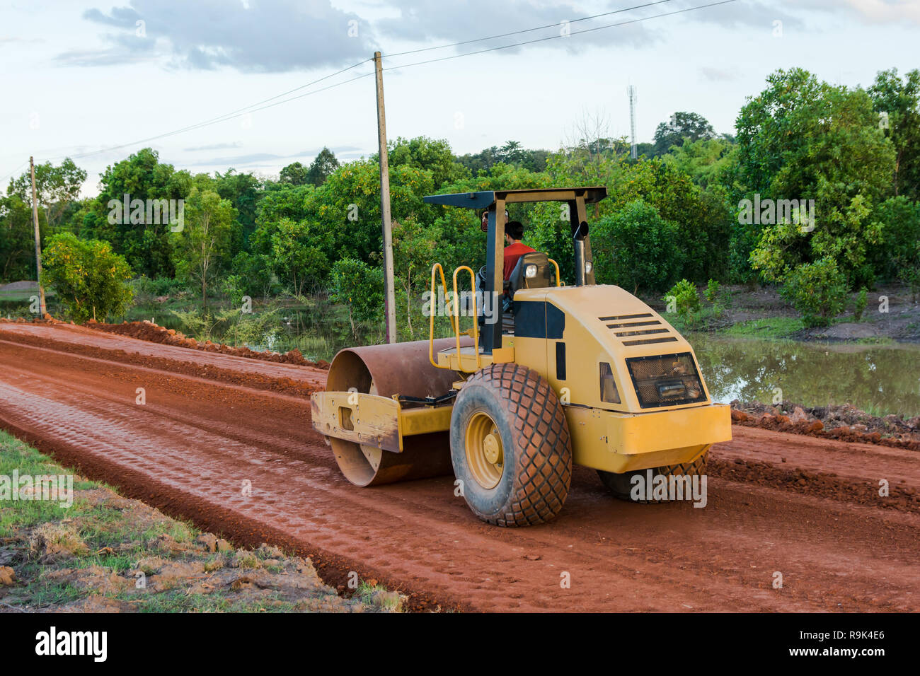 Roller steamroller or vibratory roller machine working on road