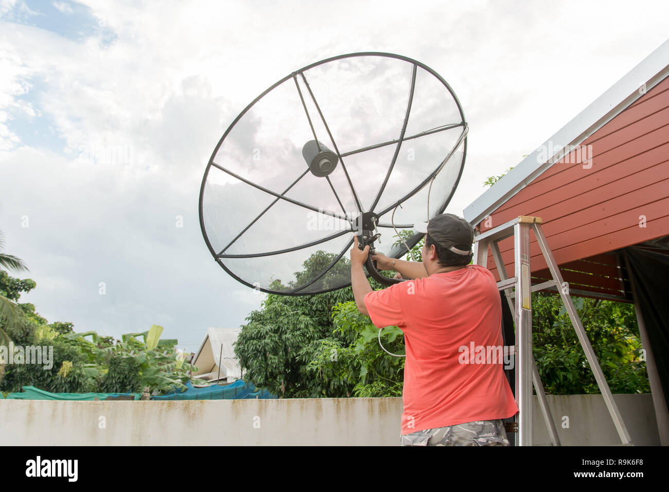 Installing satellite dish hires stock photography and images Alamy