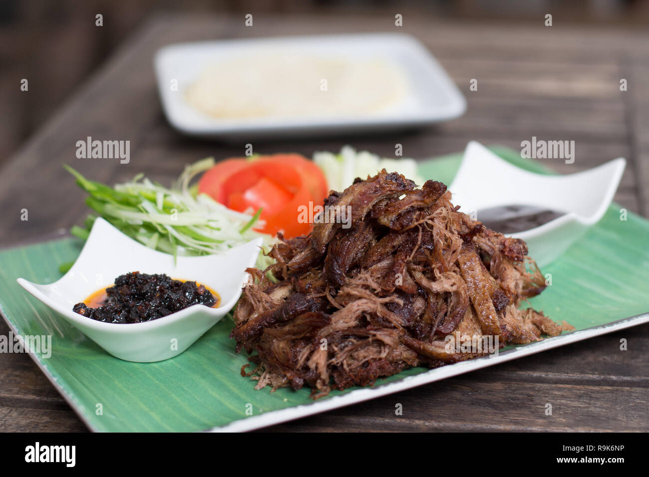 Succulent crispy duck, plum sauce, chilli oil, spring onion , cucumber