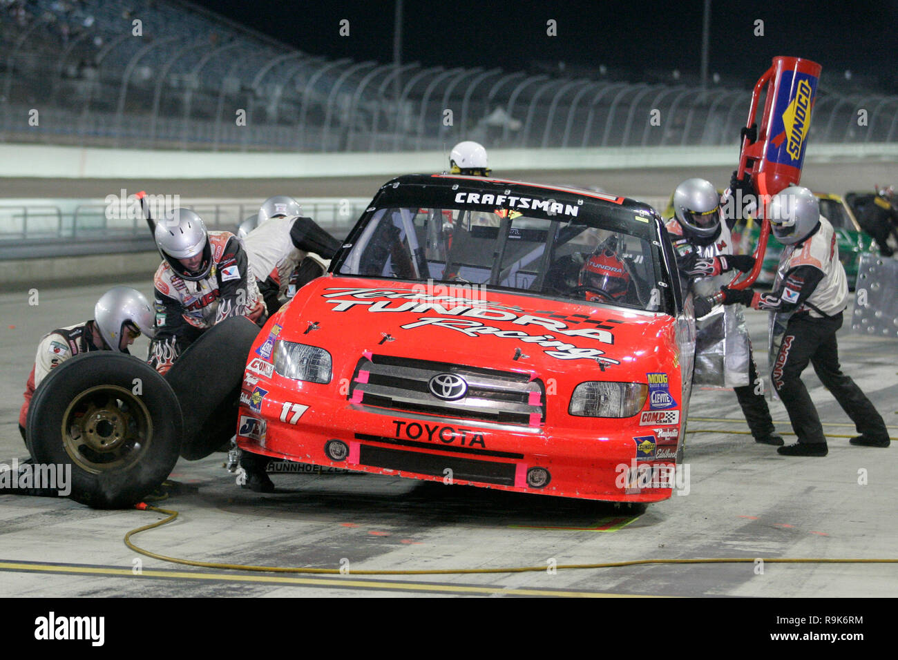David Reutimann makes an early race pit stop, during the NASCAR ...
